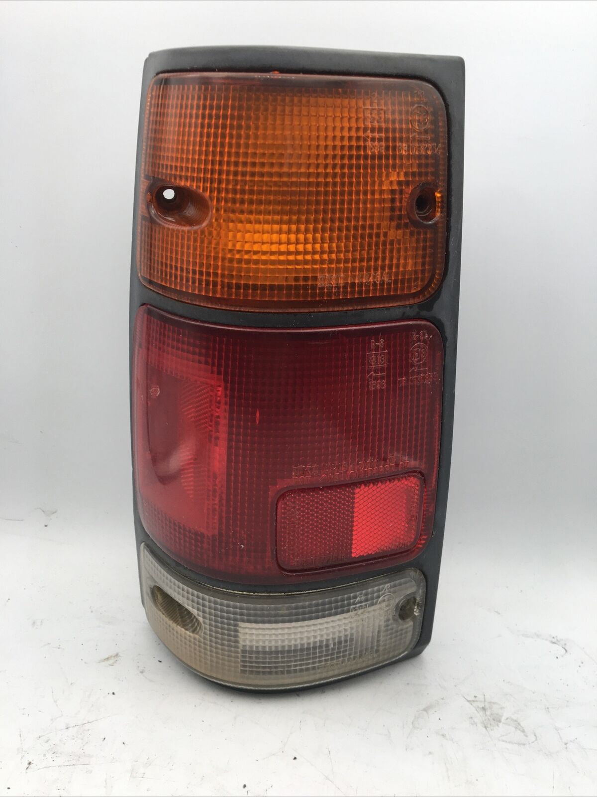 Original IKI for ISUZU Rodeo, Amigo, Pickup 1988-1997 Tail Light Turn Lens Left